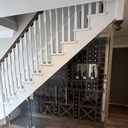 Under Stairs Glass Wine Store Cut to the Rake of the Staircase, Delamere Cheshire Under Stairs Glass Wine Store Cut to the Rake of the Staircase, Delamere Cheshire